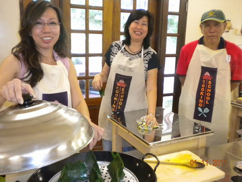Taking up cooking lessons on Nyonya cuisine in Tropical Spice Garden, Penang