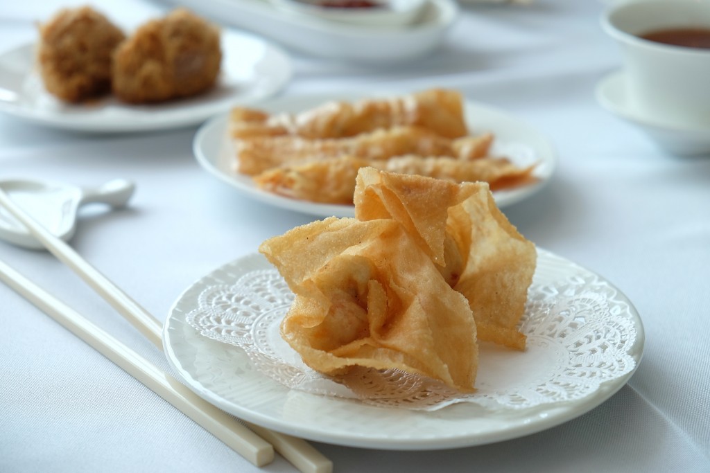 Deep-fried beancurd prawn roll, crystal prawn dumpling and the prawn wanton just come out of the fryer