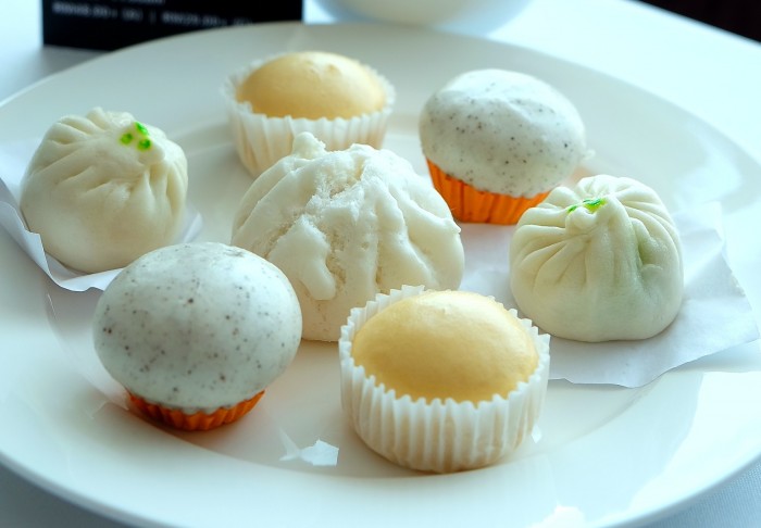 Savory and Sweet bao - salted egg yolk bun, black sesame bun, pandan kaya bun and bbq chicken bun.
